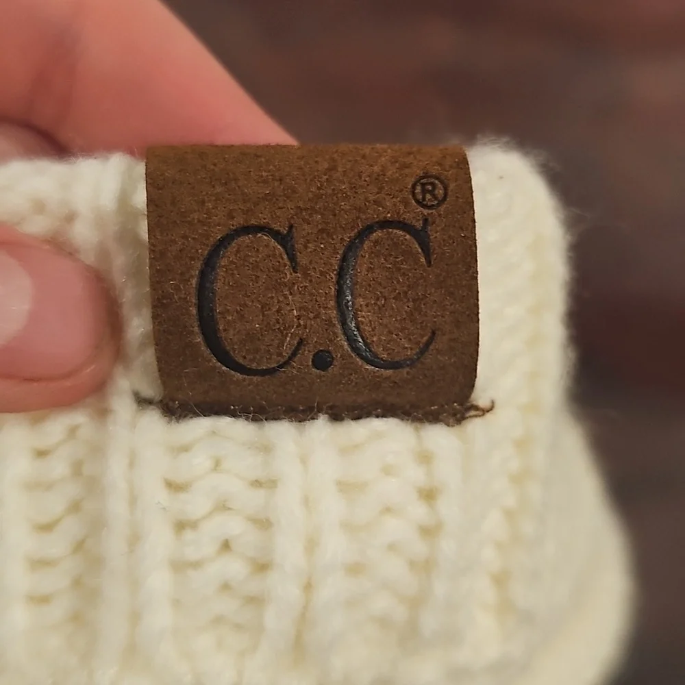 N White Knitted Hat C.C Brand No Size But Looks Great For Winter